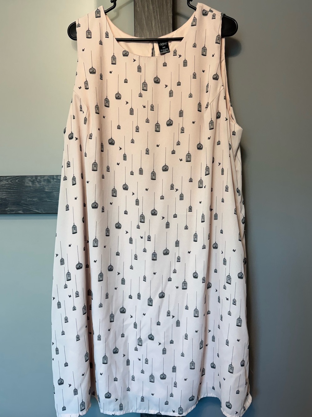 Mid length dress with birdcages